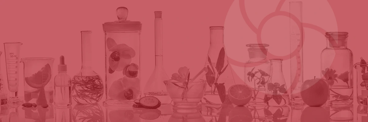 An assortment of laboratory glassware with fruit and plants inside with a light logo overlay.